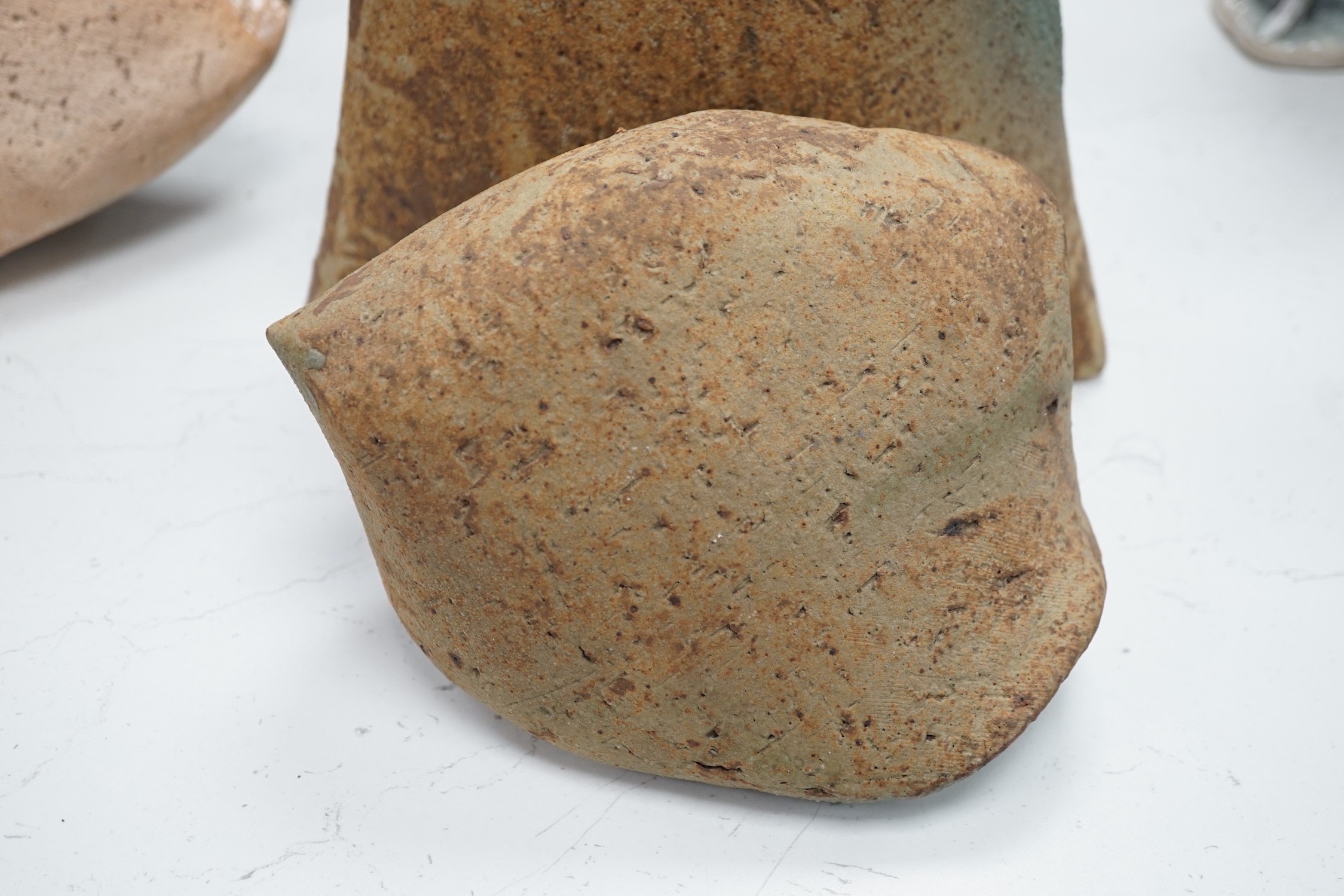 Two contemporary stoneware sculptures and a bottle vase, 35cm